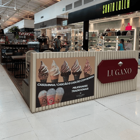 Logo da loja lugano gramado