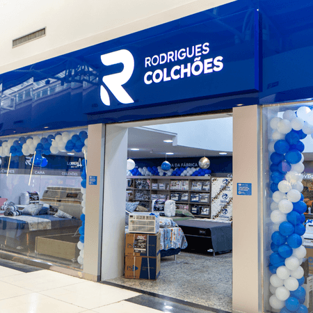 Logo da loja rodrigues colchões
